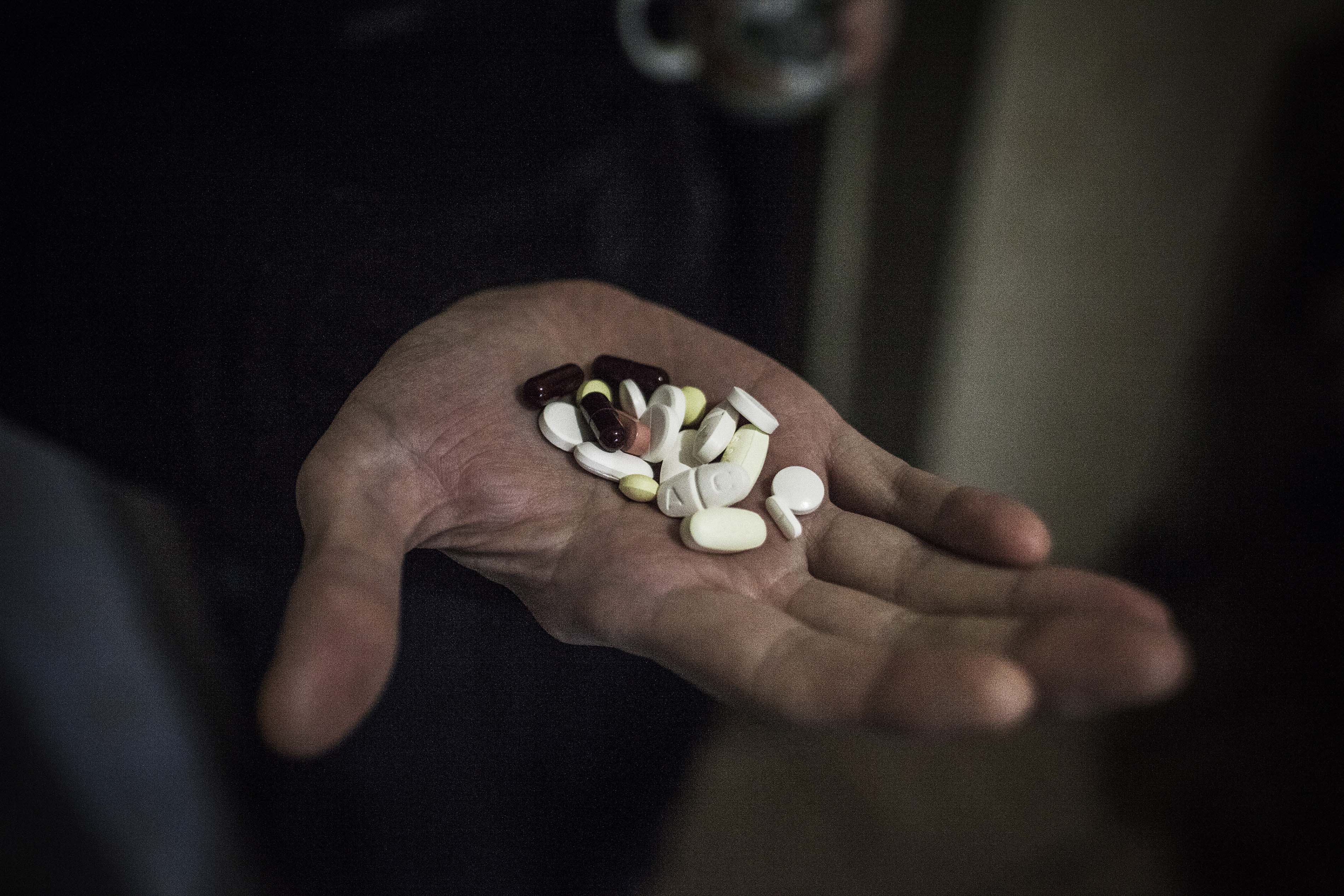 A patient with TB shows the pills for his treatment in a prison in Donetsk, Ukraine, where MSF is helping to treat patients infected with TB. MSF has been running a TB treatment program within the penitentiary system in Donetsk since 2011.