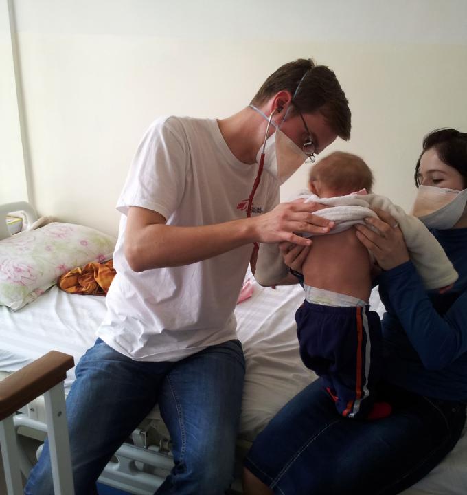 MSF Dr. Christoph Hoehn and nurse Gulru Nobodieva examine a nine-month old baby in Dushanbe, Tajikistan.