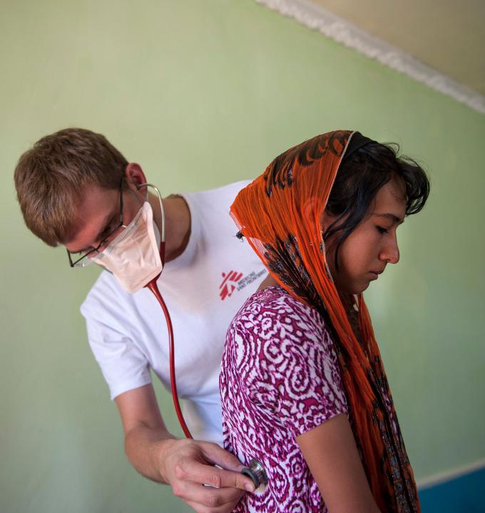 MSF doctor Christoph Höhn examines 16 year-old-Shahnoza in her family home. Shahnoza started MDR-TB treatment in October 2012 but was later diagnosed with XDR-TB. Since January 2013, she is on the right drug regimen, but she will need another 1,5 years of treatment.