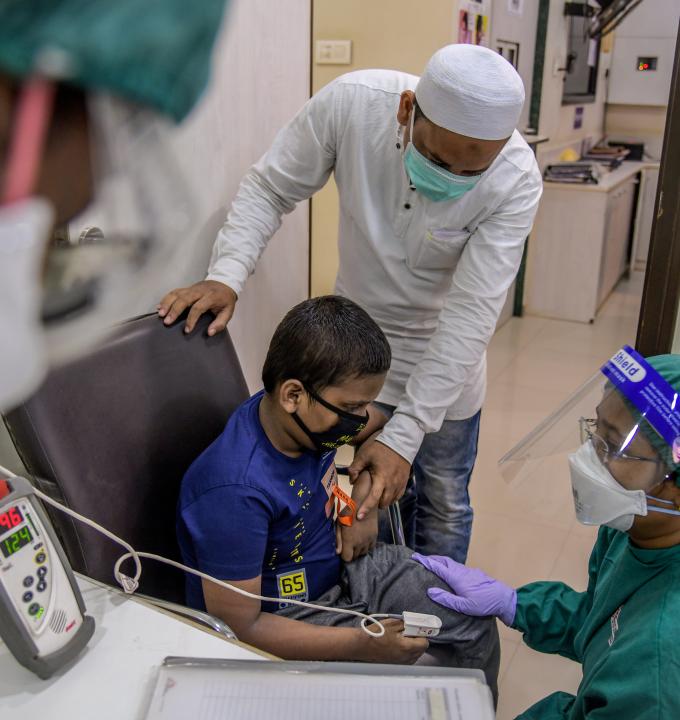 MSF Nurse taking vitals of nine years old XDRTB + EPTB male child at MSF independent Clinic, Mumbai- India