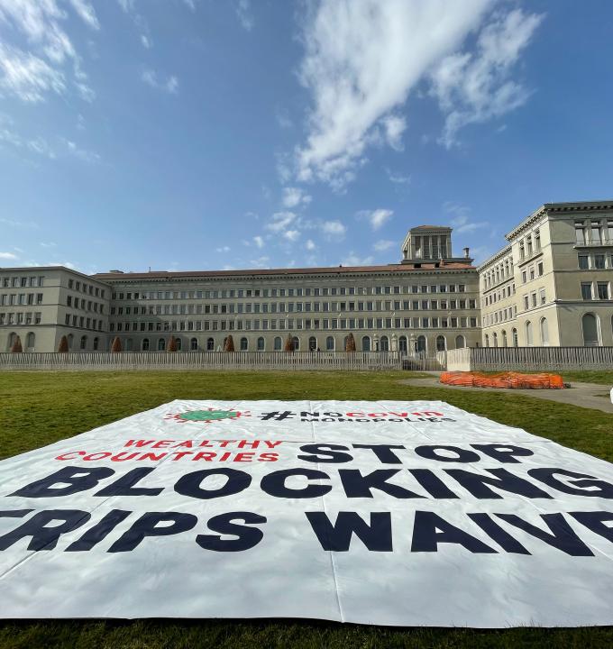 View of the banner deployed by MSF in front of the World Trade Organization (WTO) in Geneva calling on certain governments to stop blocking the landmark waiver proposal on intellectual property (IP) during the pandemic.