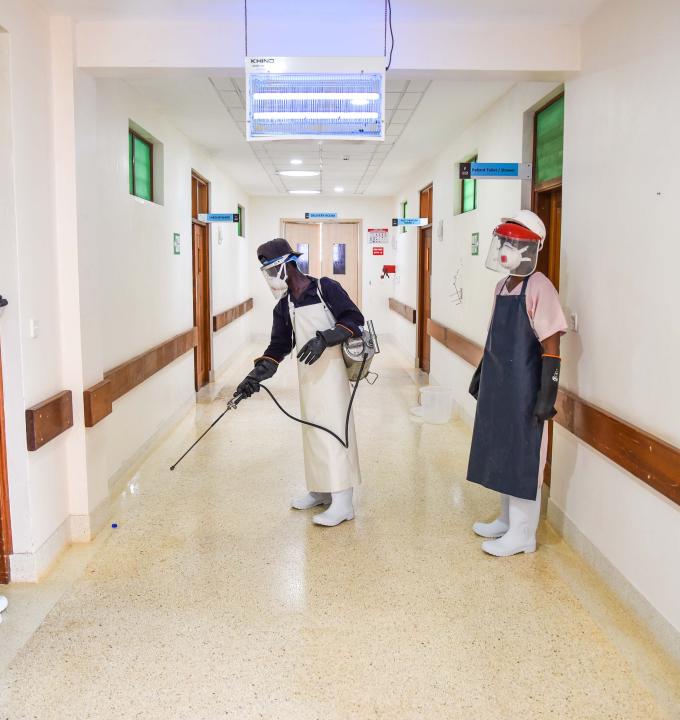 MSF’s hygiene staff disinfecting the halls of Mrima Hospital in Likoni, Mombasa recently. 