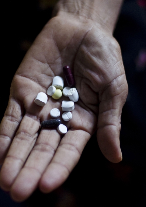 Daily dose of pills for Hekim, 40, a XDRTB patient from Myanmar currently staying in Moreh, a town in Manipur that borders Myanmar, for her treatment from MSF. Moreh, Manipur, India, 25 October 2012.