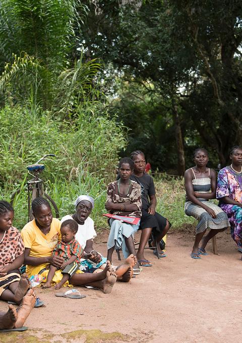 A group of ladies sit waiting for consultations, or to see the MSF medical doctors at an MSF mobile clinic site in Bodo, a village just outside Yambio, in Gbudwe State, South Sudan. Photograph by Charles Atiki Lomodong