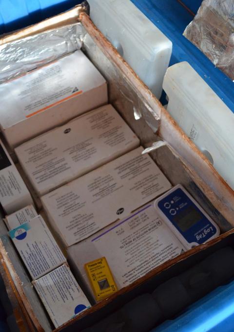 A coolbox full of vaccines for the massive MSF multi antigen campaign in Bangassou sub-prefecture, Mbomou prefecture, CAR. Photograph by Sandra Smiley
