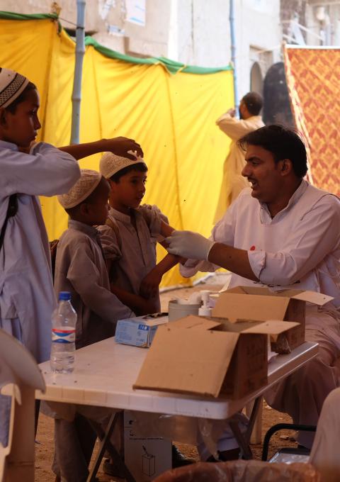 MSF vaccinated 31,126 children against measles during a 15 day campaign in the crowded slum area of Machar Colony, in Karachi, Pakistan. MSF has been running a primary and emergency healthcare and obstetric clinic in Machar Colony since 2012. Photograph by Husni Mubarak Zainal