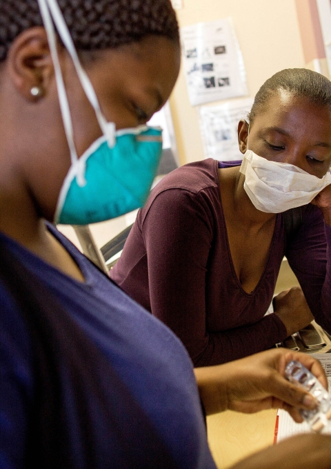 Simbongile Xesha collects her medication from the pharmacy at Town 2 Clinic, Kuyasa, Khayelitsha, South Africa. 2016.