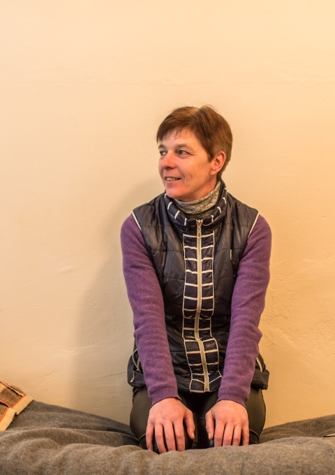 Nataliia, 44, has extensively drug-resistant TB (XDR-TB). Here she is pictured sitting on her bed at the Zhytomyr Regional TB Dispensary.