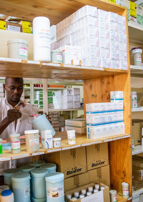 A nurse from “L’Arche de Kigobe” trauma center in Bujumbura comes to the structure’s pharmacy to get medicines.