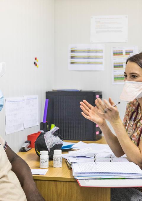 Dr Louisa Dunn, a sub-investigator on the TB Practecal clinical trial consults with a patient