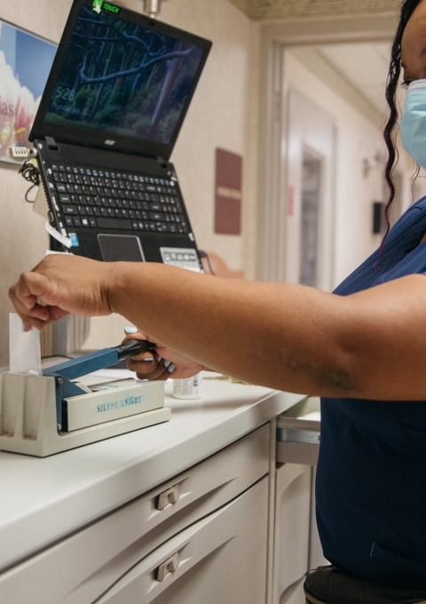 At Advantage Living Center in Roseville, Michigan, Janelle prepares medication for a resident