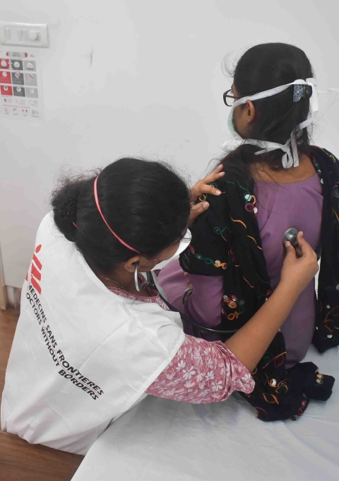 MSF Medical Doctor Ramya, conducting physical examination of female DRTB patient during her follow-up visit to endTB clinic.