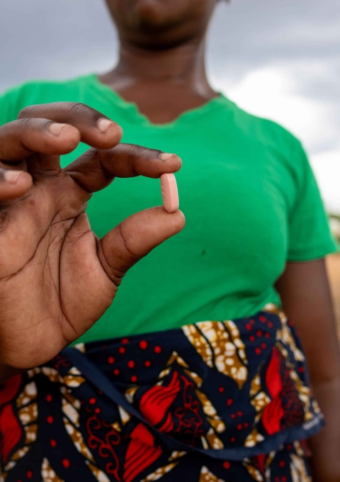 Maria Atonio, 43-years-old farmer from Macomia, shows Anti-retro-viral medication after visiting MSF’s Clinic in Nanga, Mozambique.