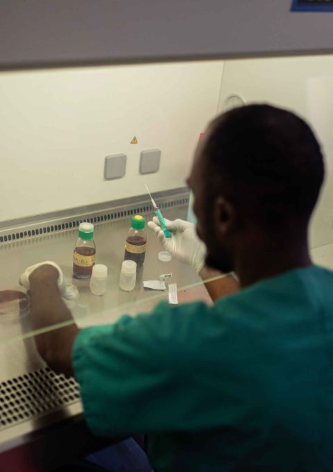 In the mini laboratory set up by MSF in SICA hospital, Bangui, Justin, laboratory technician and Nicaise, laboratory supervisor analyze samples collected from patients. They check liquid and solid samples to detect the potential presence of resistant bacteria.