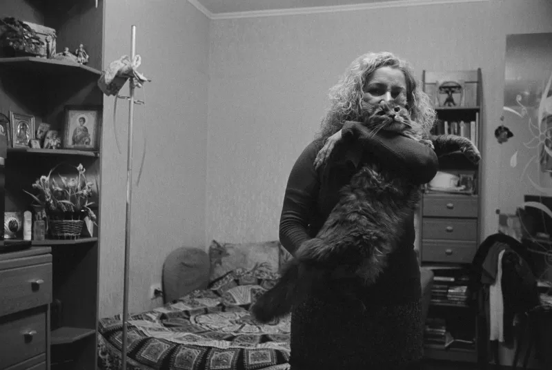 Iryna Parakhonko and her beloved cat, Ukraine, 2018.