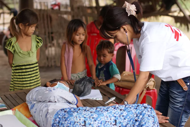 MSF staff conduct a home-based visit for a DR-TB patient in Kampong Cham province, Cambodia.