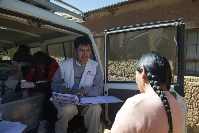 An MSF doctor consults with patients in the community of Comum Pampa, Bolivia 2012.