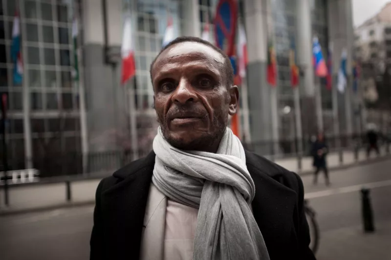 Jimmy Gideyi, an HIV/AIDS Kenyan activist, traveled to Europe to explain to the European Parliament how harmful provisions in trade agreements could stop the flow of affordable generic medicines that he and many other depend on to stay alive, Belgium 2011.  