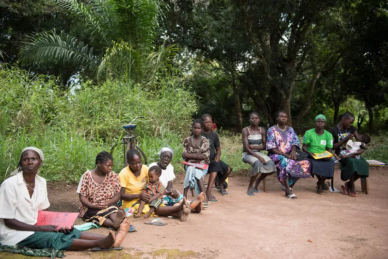 A group of ladies sit waiting for consultations, or to see the MSF medical doctors at an MSF mobile clinic site in Bodo, a village just outside Yambio, in Gbudwe State, South Sudan.