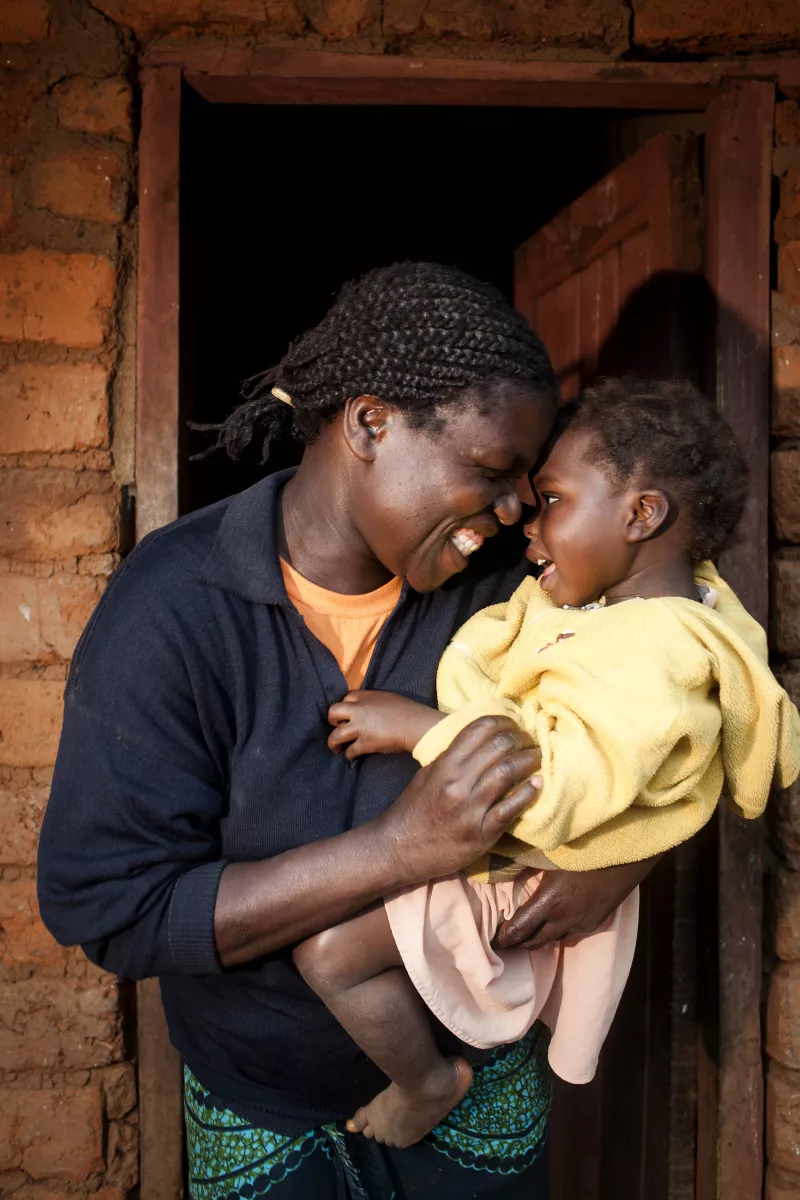 Edna Maulana holds her child, who was born HIV-free after she went through the PMTCT program in Thyolo.