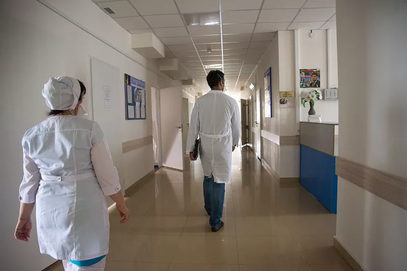 MSF doctors Animesh Sinha and Milana Khusainova in the corridor of the XDR TB department at the Republican TB Dispensary in Grozny, Chechnya