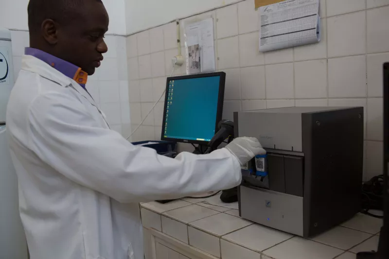 Laboratory in Primeiro de Maio Health Centre. MSF staff working for rapid diagnosis for Tuberculosis through GeneXpert machine. This equipment gives the result within 2 hours, including the possibility of drug resistance. Maputo, Mozambique. Photograph by Andre Francois