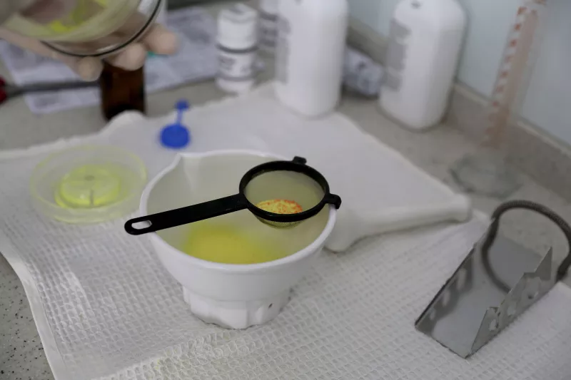 MSF staff grind tablets and turn them into a syrup, which is much easier for the young TB patients to digest. Photograph by Joosarang Lee