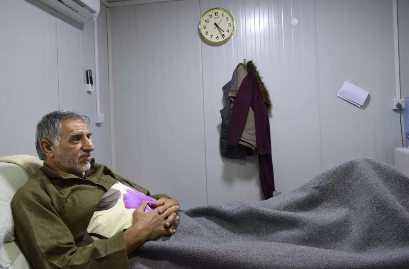 Hani Tah Suleyman, 63 years old, in his room in MSF’s post-operative care facility in East Mosul.