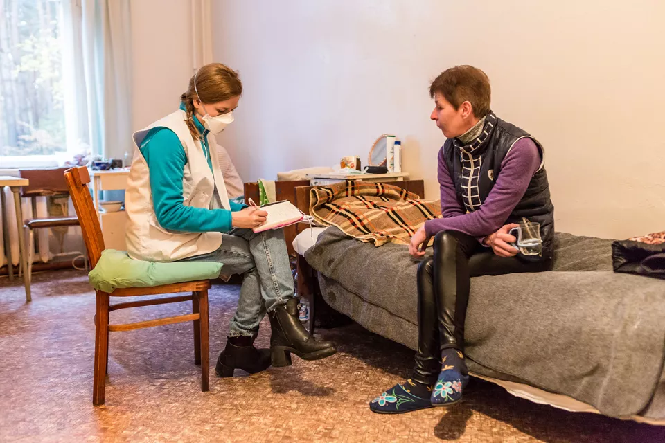Tetiana Dolgova, MSF field communication officer, conducts an interview with Nataliia Klymyk, 44, who has extensively drug-resistant tuberculosis (XDR-TB).