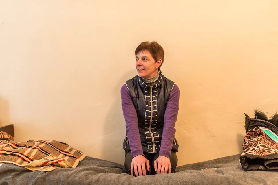 Nataliia Klymyk, 44, has extensively drug-resistant TB (XDR-TB). Here she is pictured sitting on her bed at the Zhytomyr Regional TB Dispensary. 