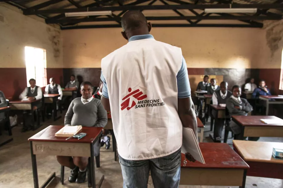 Learners of Hhashi High School stand in line to receive HIV Counselling and Testing at Medecins Sans Frontieres (MSF) Mobile 1-Stop Shop. 