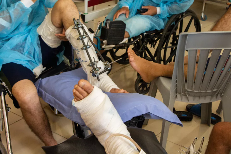 Three patients injured during the March of Return are sitting by each other during a health promotion session about Antibiotic resistance, at one of MSF’s hospitals in Gaza.