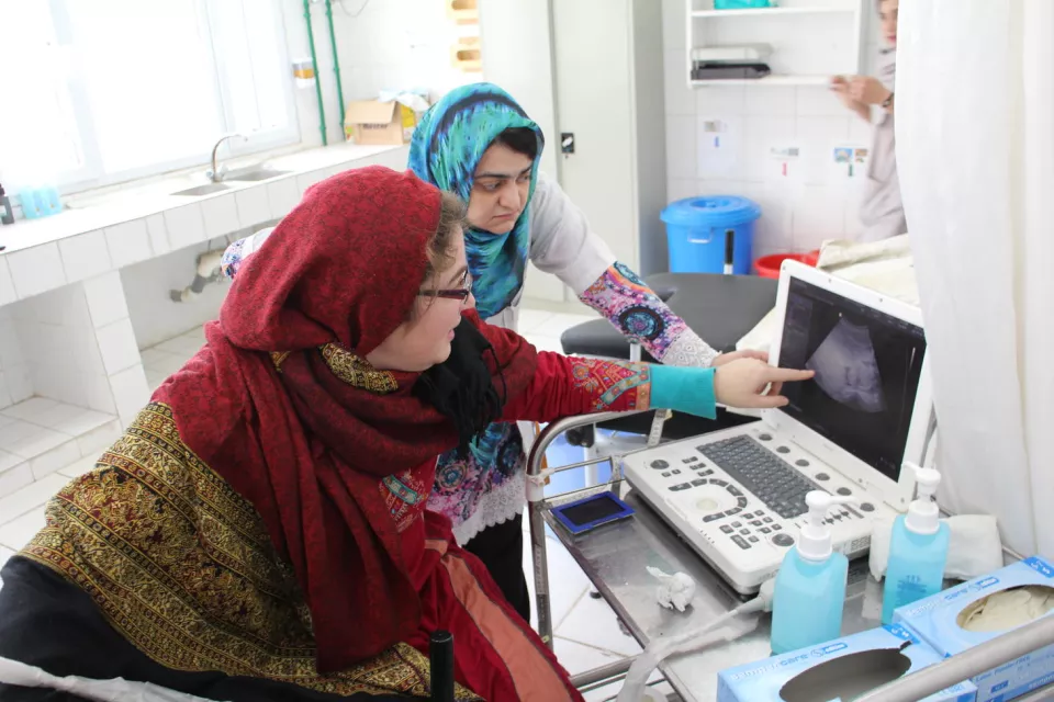 MSF gynaecologist Severine Caluwaerts works together with Afghan doctor Dr Shafika at the MSF maternity in Khost. They perform ultra sound in an ante-natal checkup for a patient. The maternity is fully run by MSF to provide an environment for safe deliveries.