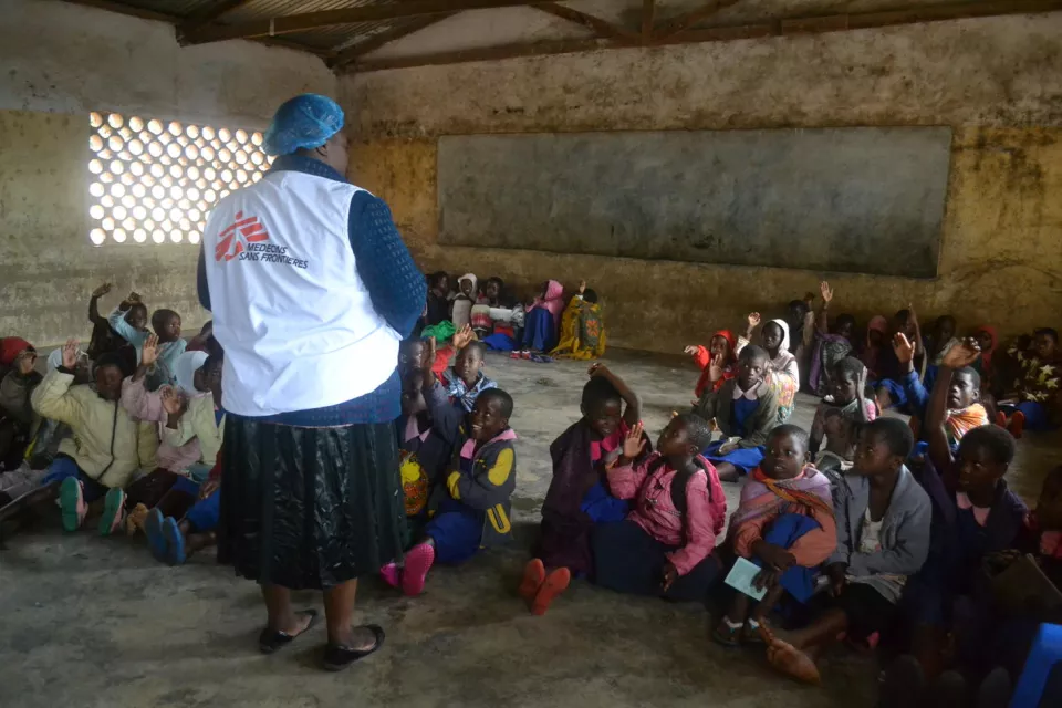 Interpreter Tifera explains to the girls what is happening today and answers their questions. 