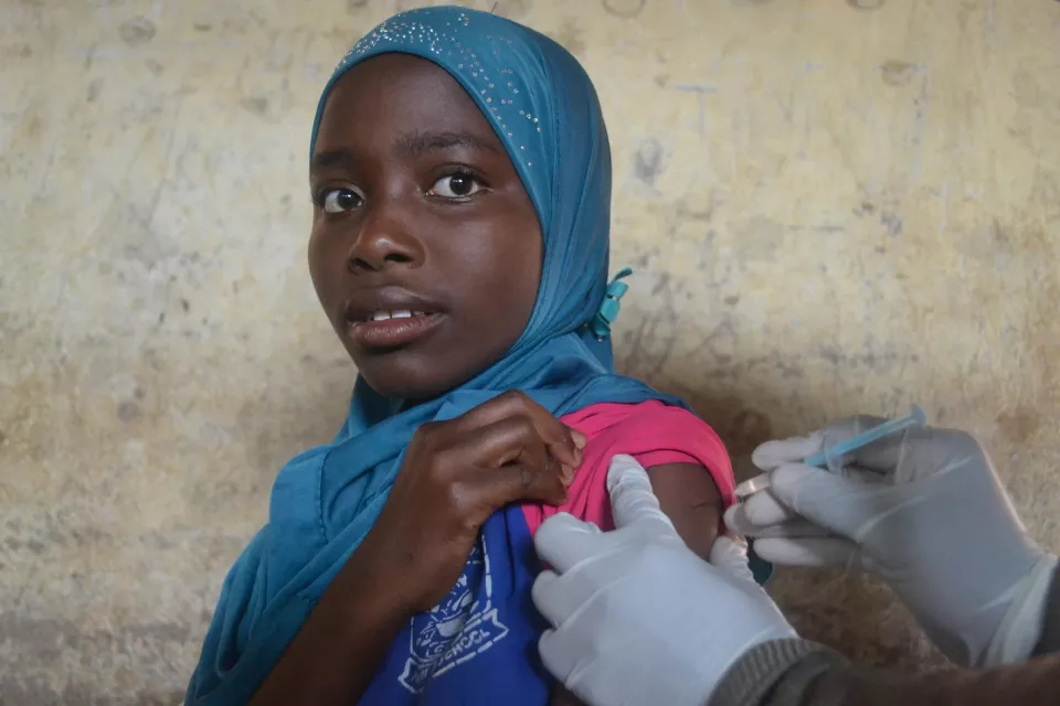 Shila, 9, is vaccinated against HPV. 