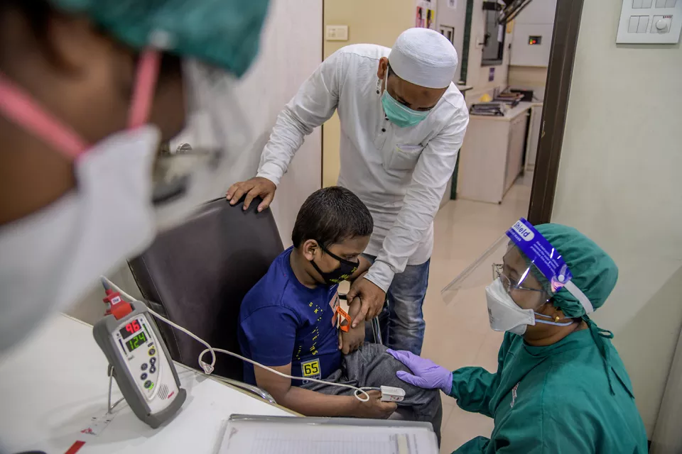MSF Nurse taking vitals of six years old boy with drug-resistant TB at MSF independent Clinic, Mumbai- India