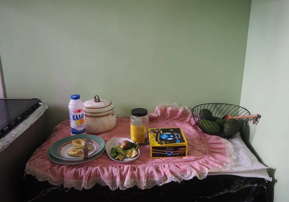 Cut avocados in Amina’s kitchen. Athens, Greece.