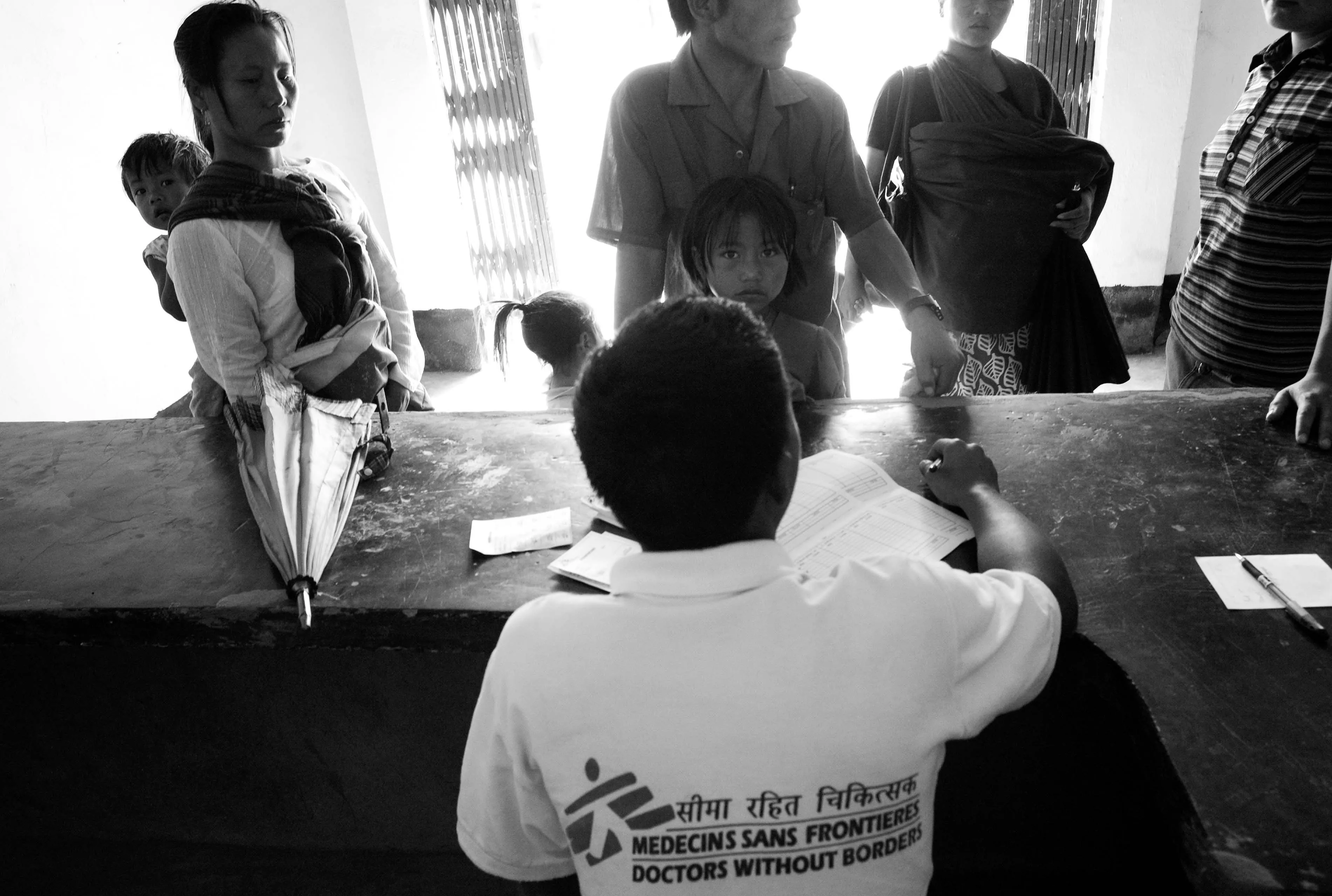Mother and children register for their Hepatitis-B Vaccination at the MSF Chapikarong clinic. February, 2009, Manipur, India.