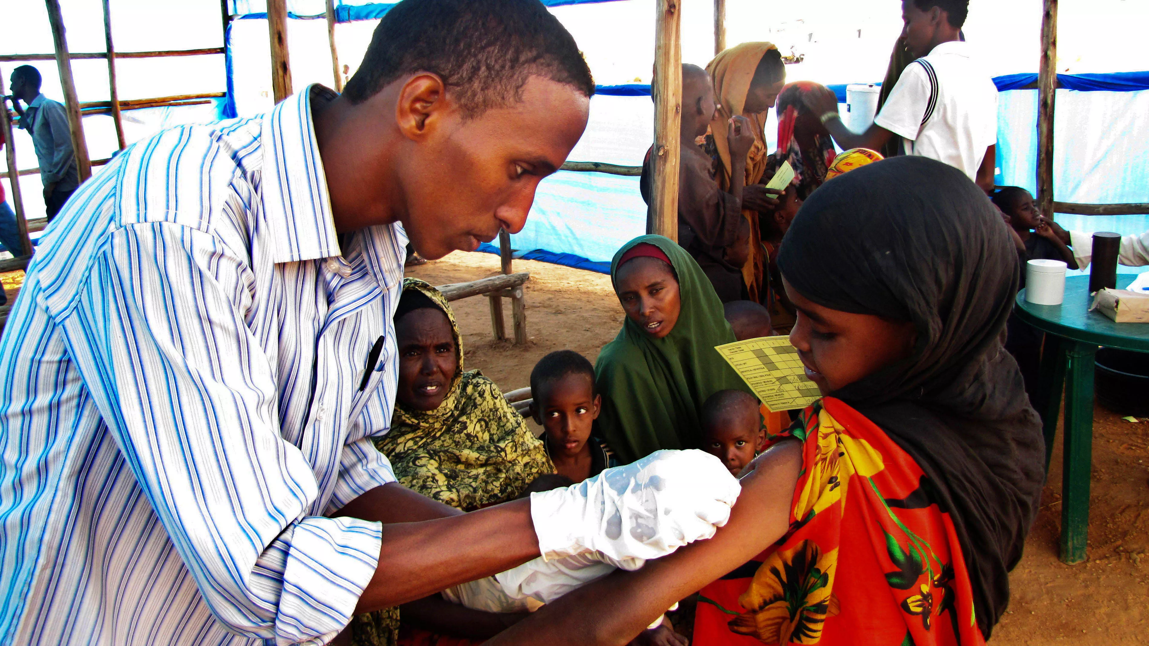 Measles vaccination. Some six hundred under-15s are vaccinated every day at the transit camp. Coupled with high levels of malnutrition, measles can be fatal.