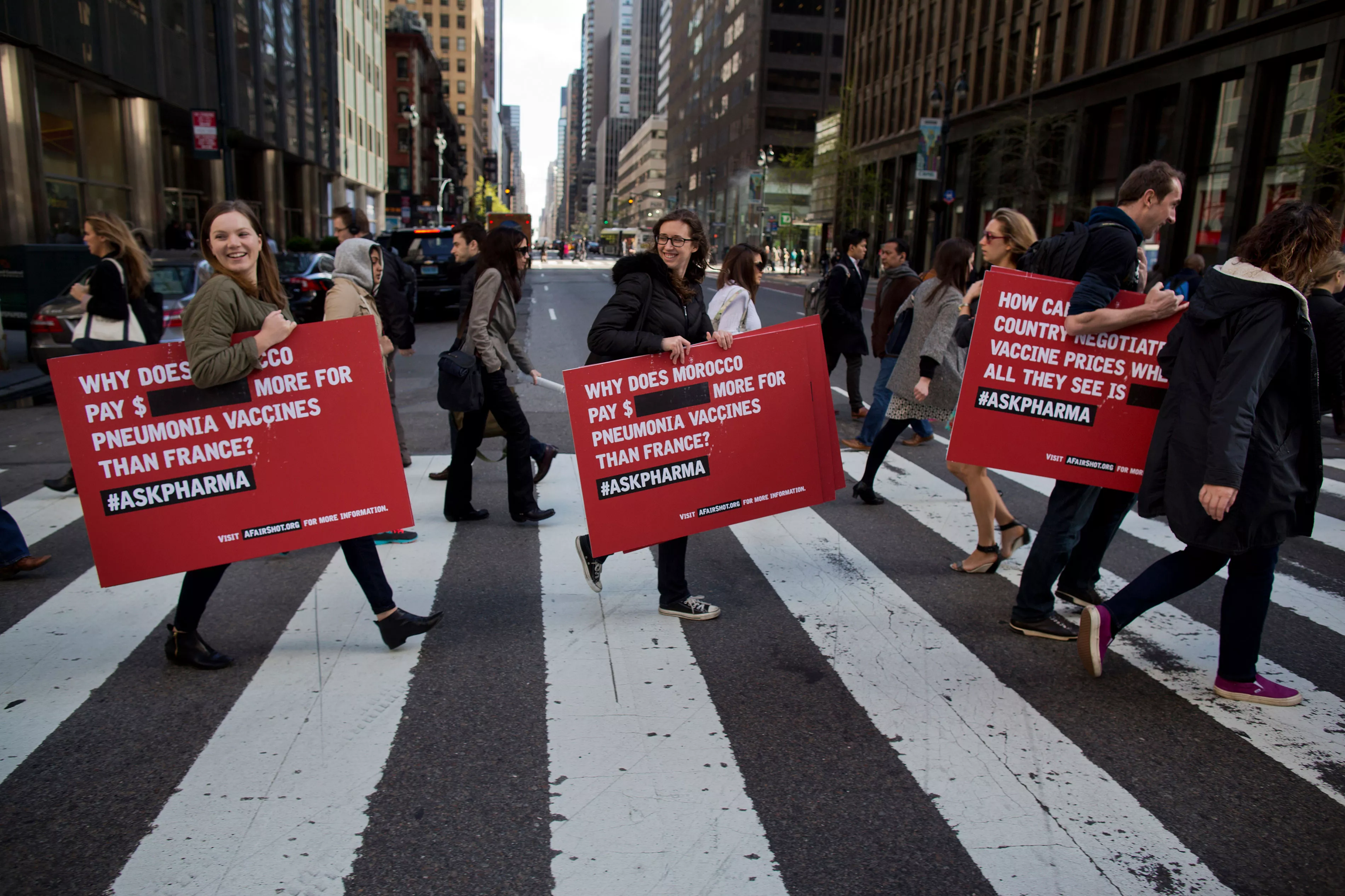 Activists from Doctors Without Borders protest vaccine pricing policies in front of the Pfizer World Headquarters in New York NY, Thursday, April 22, 2015. Pfizer refuses to publish the price of the pnuemococcal vaccine, preventing developing countries from negotiating a fair price for the drug.