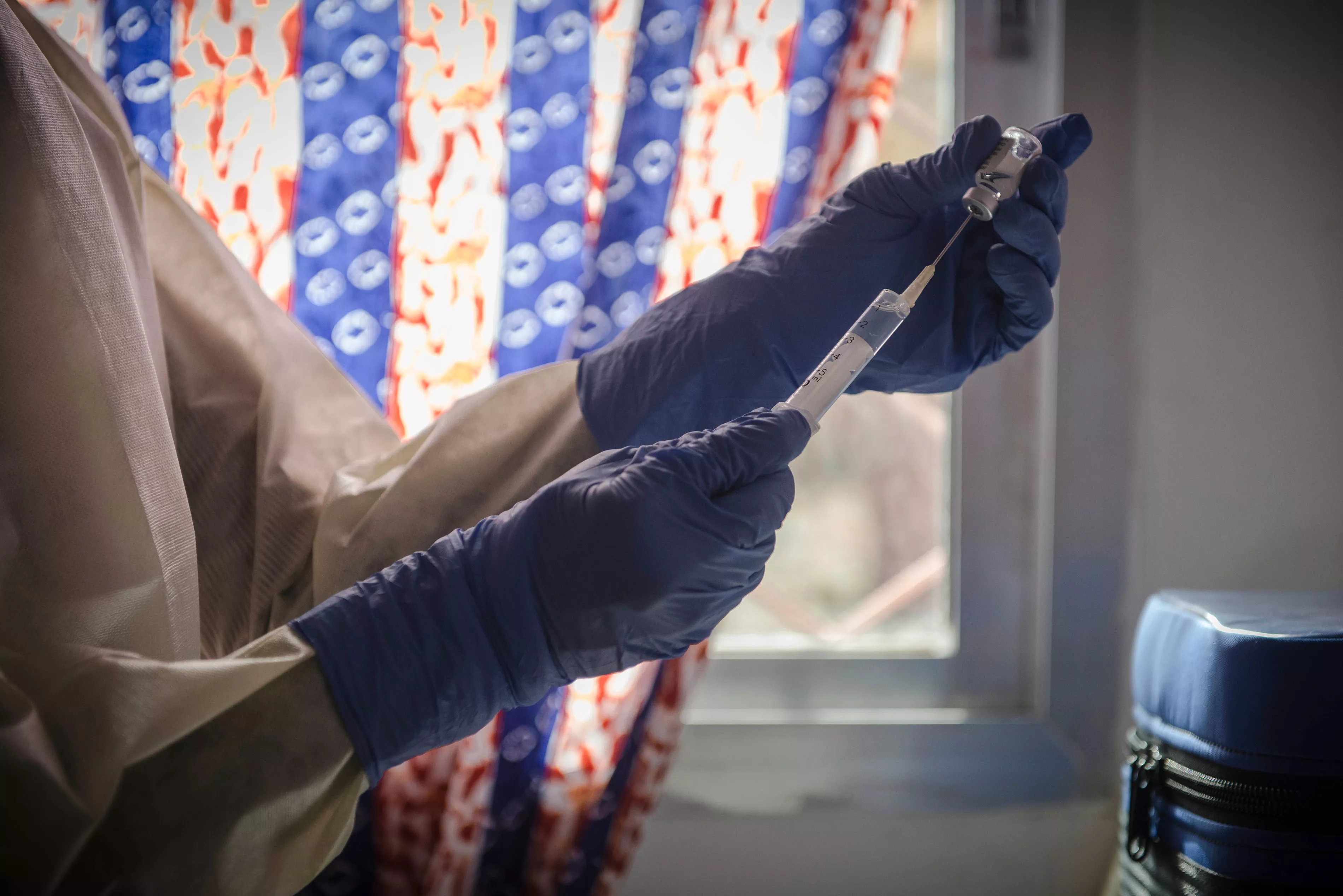 MSF staff prepares a dose of an experimental vaccine