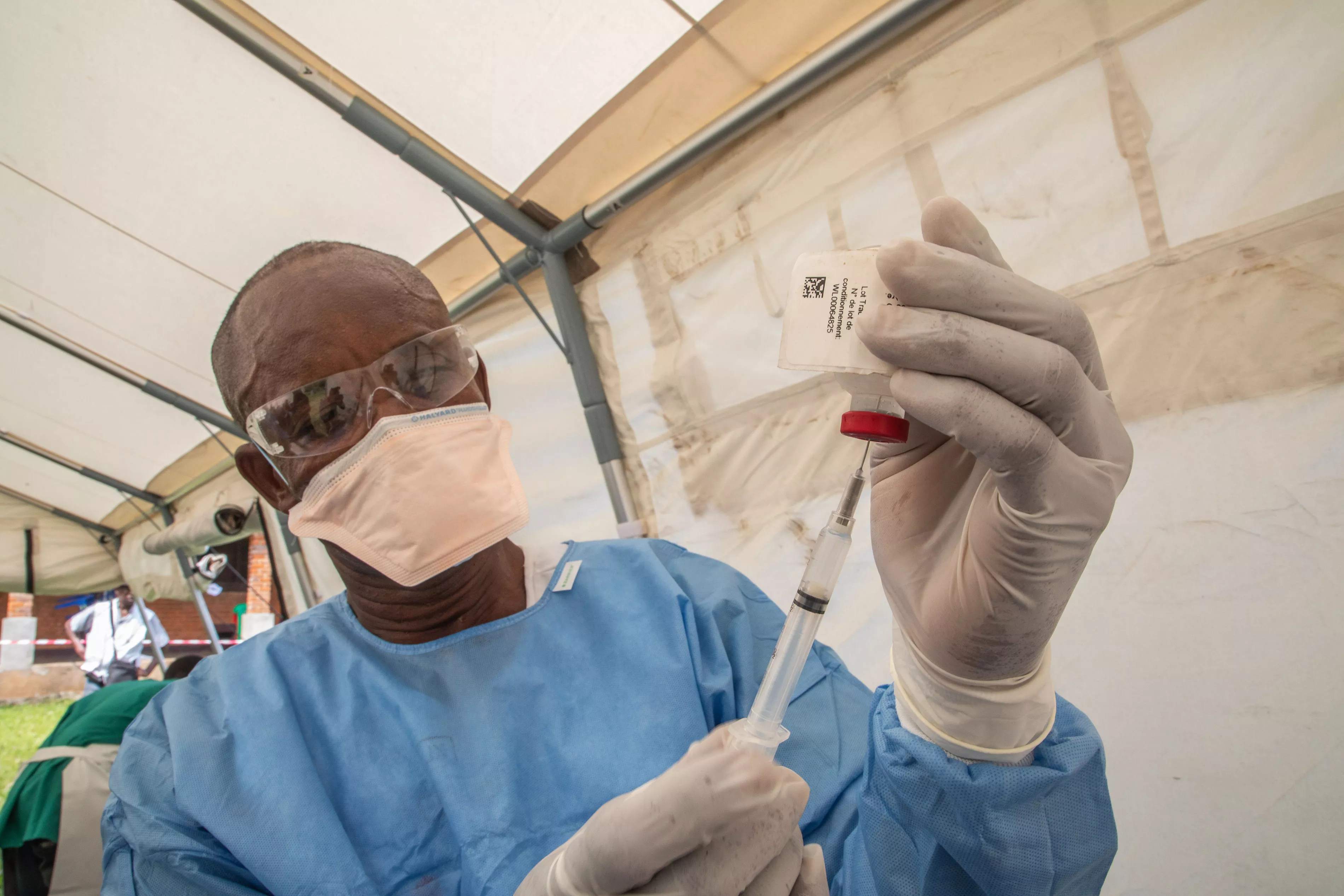 Nurse prepares the Ebola vaccine in the site of Bikoro, DRC 2018.