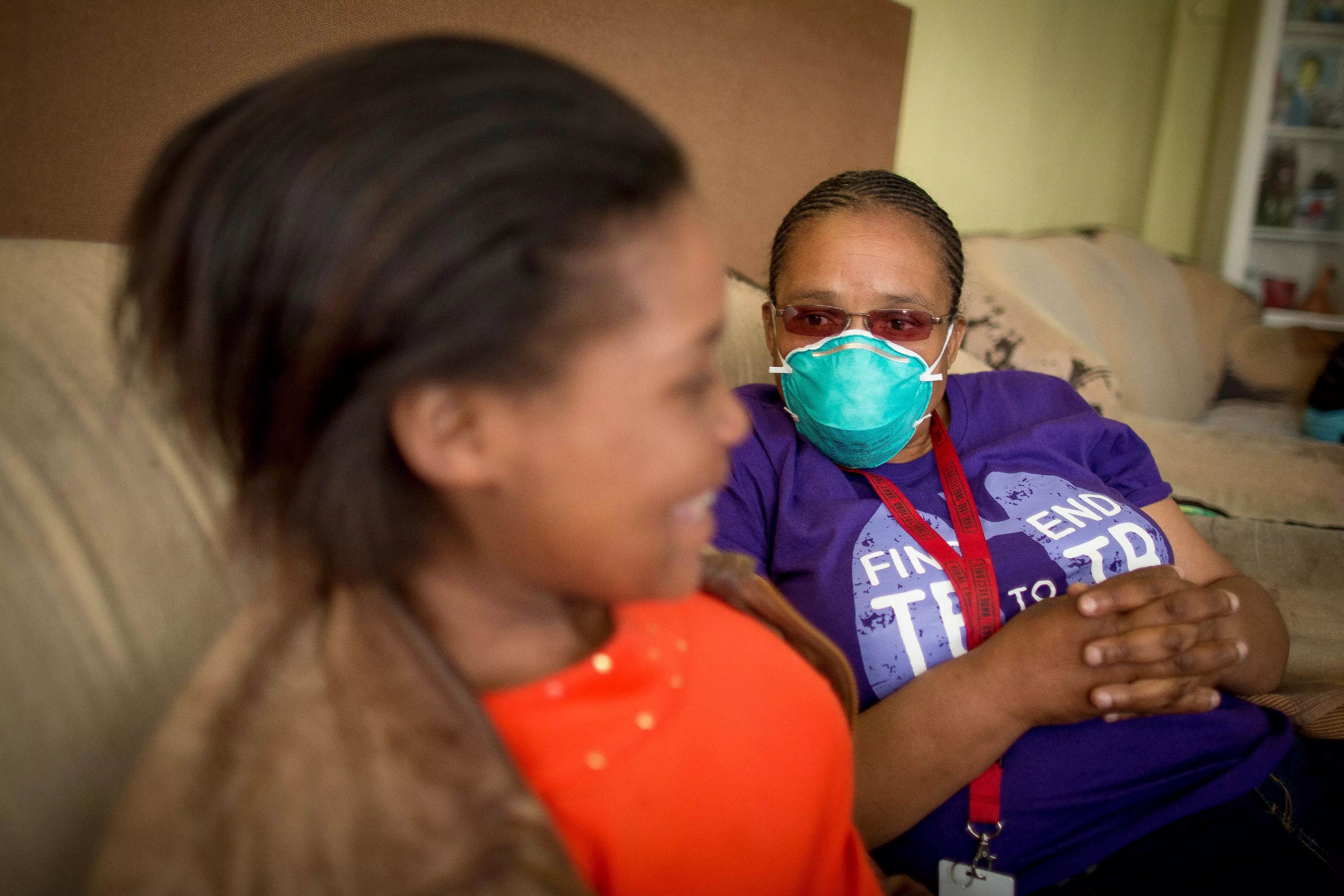   Sinethemba, 16 years,her MSF counsellor, Xoliswa, at her home in Khayelitsha, Western Cape, South Africa, where she lives with her grandmother, Vuyisiwa Madubela, and four other familtb_southafrica_sinethembawithcounselor_msf177617_sydellwillowsmith.jpg