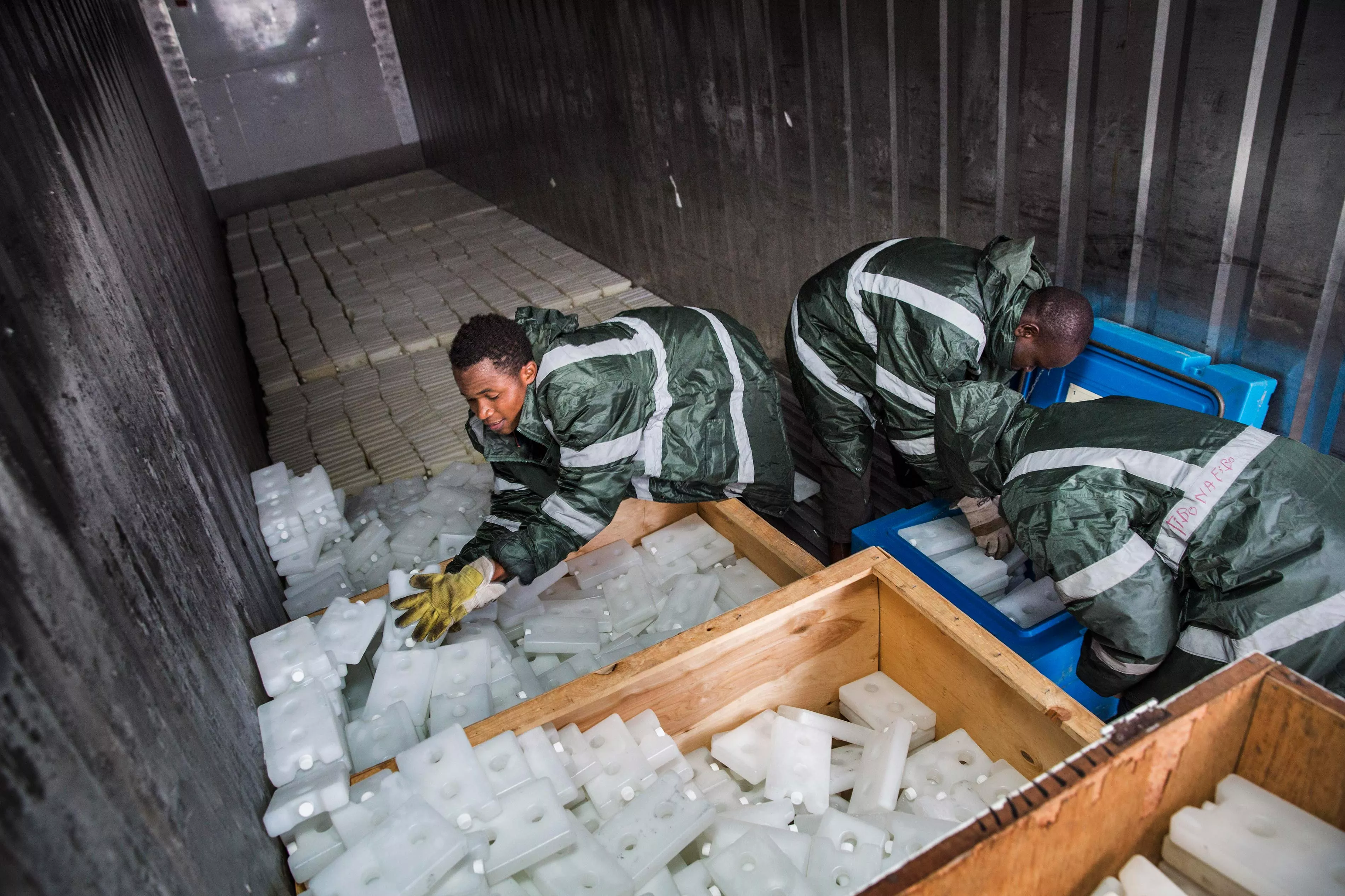Medecins Sans Frontieres (MSF) staff stock 17.000 icepacks in cooler containers for use in the massive Yellow Fever vaccination campaign in DRC