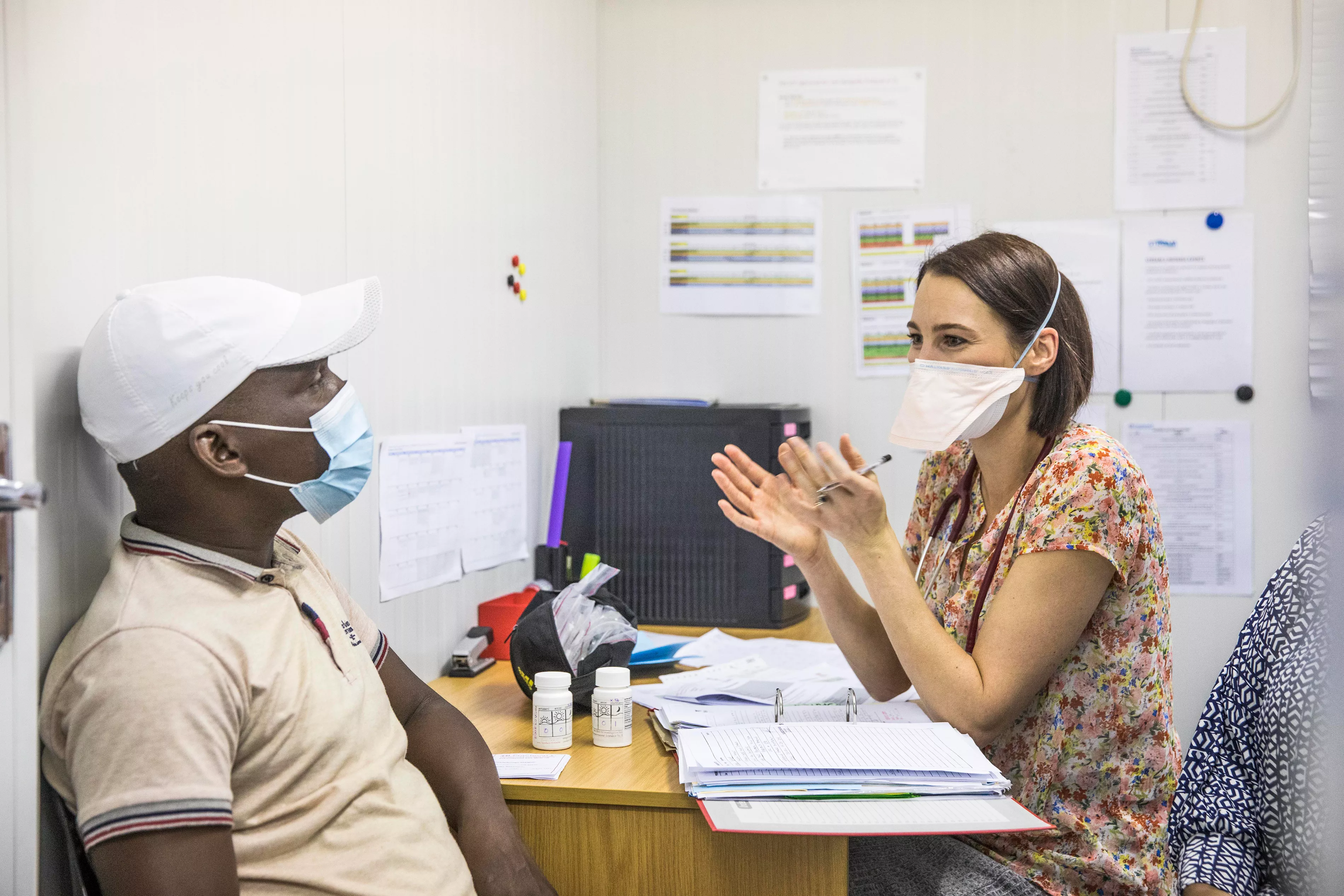 Dr Louisa Dunn, a sub-investigator on the TB Practecal clinical trial consults with a patient