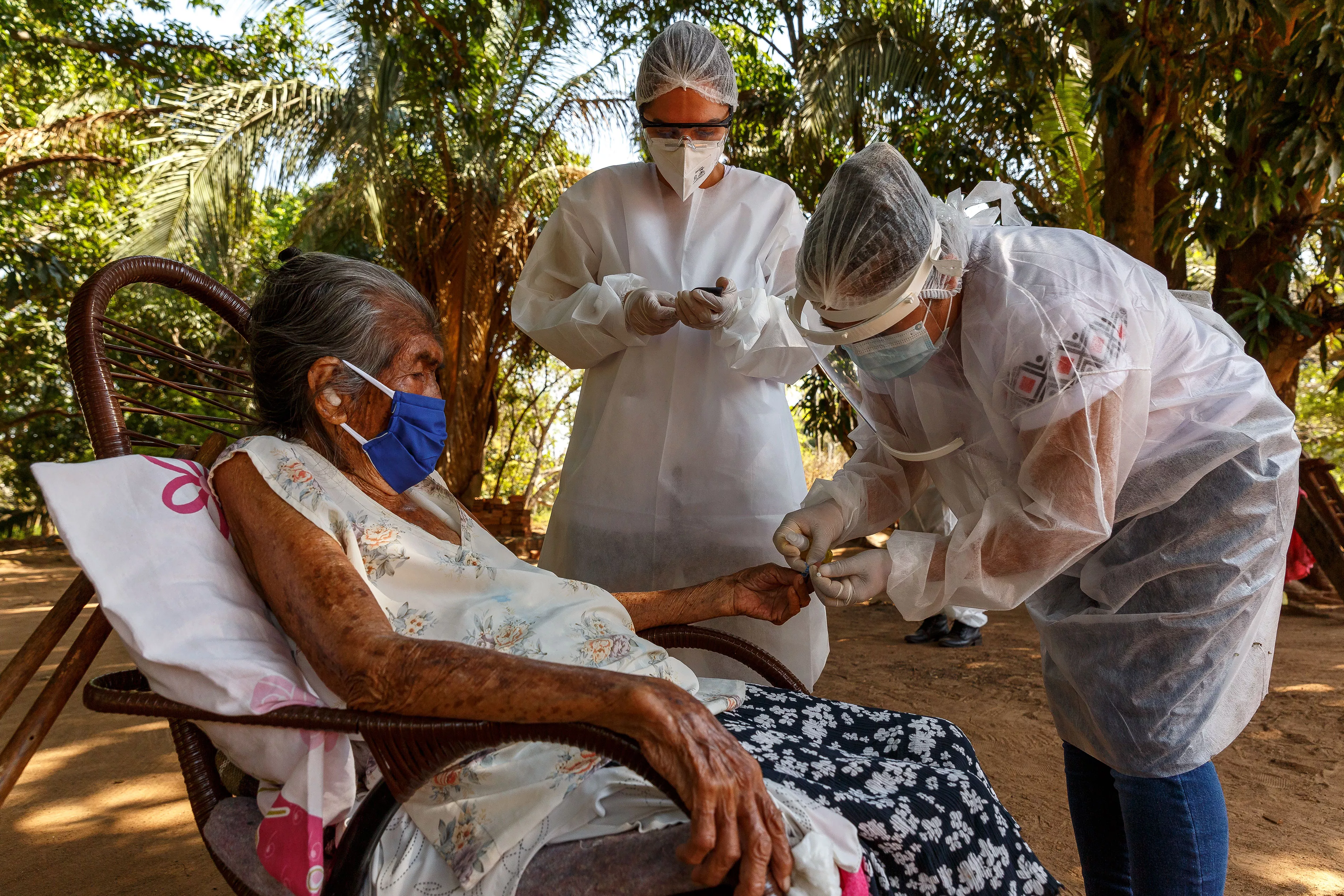 Nurse Mayra Leandro works with the health worker of the Special Indigenous Health District of Mato Grosso do Sul (DSEI MS) who attends patients at Lagoinha village. The sugar level of her blood is tested, as many indigenous people suffer from diabetes. 