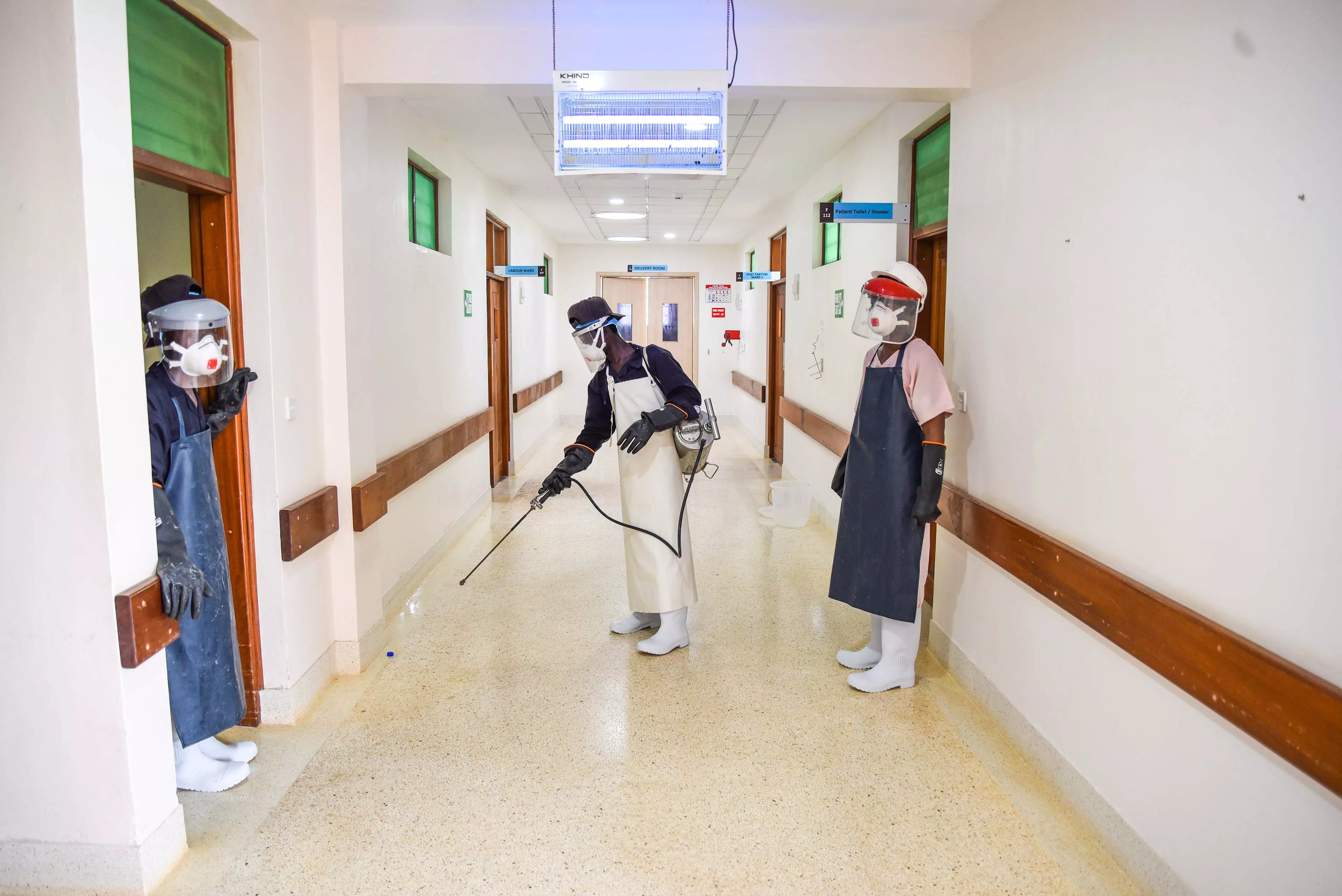 MSF’s hygiene staff disinfecting the halls of Mrima Hospital in Likoni, Mombasa recently. 