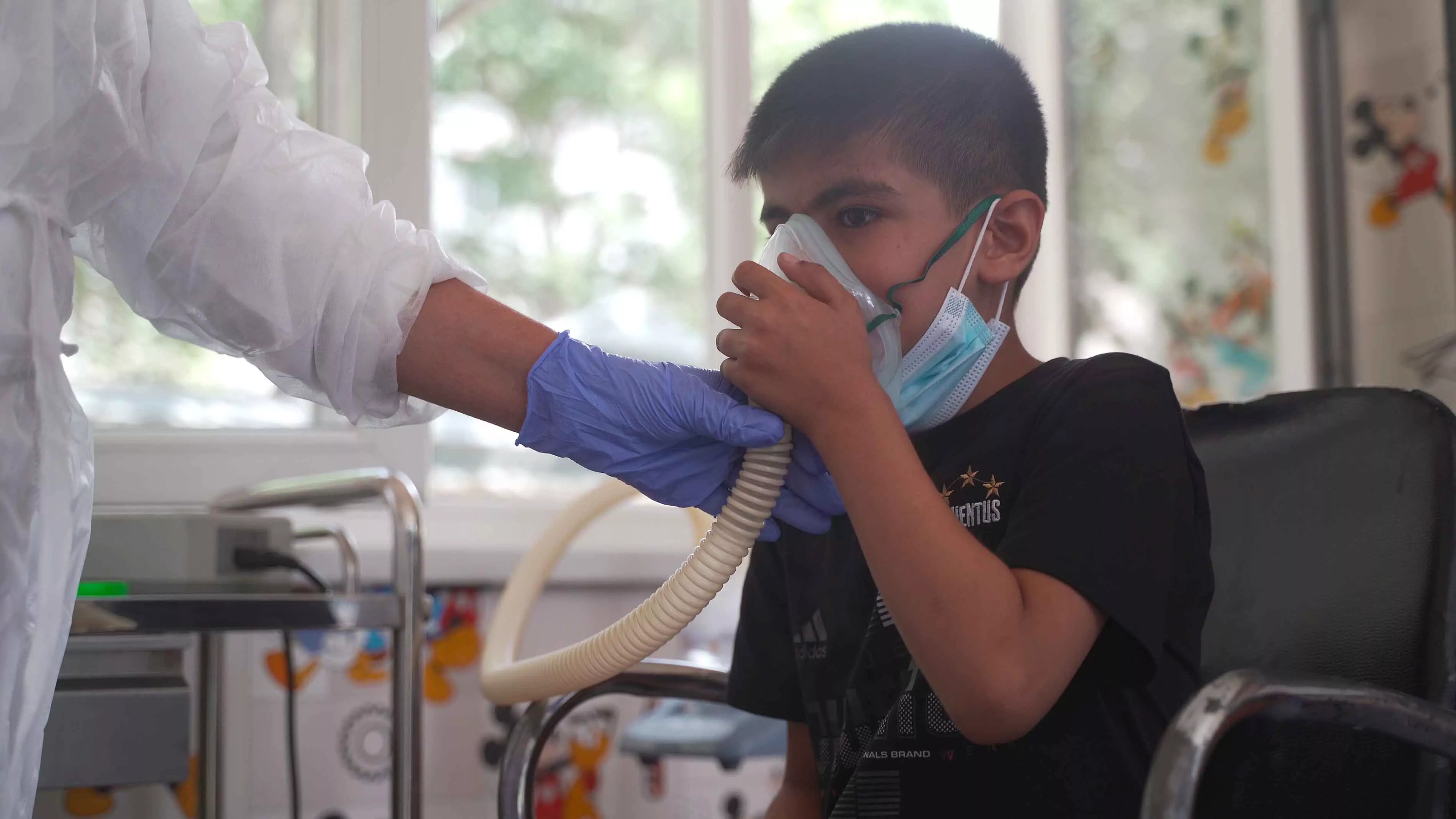 Muhammad Yusuf (8) is undergoing a sputum induction in a specialized room in Paediatric TB hospital in Dushanbe. Sputum is a thick mucus that adults cough up when their lungs are diseased or damaged. Analysing sputum culture is considered the best way to diagnose TB. However, children have great difficulty in producing it themselves. Sputum induction uses a nebulizer machine through which the child inhales concentrated saline solution, that leads to coughing and sputum production.