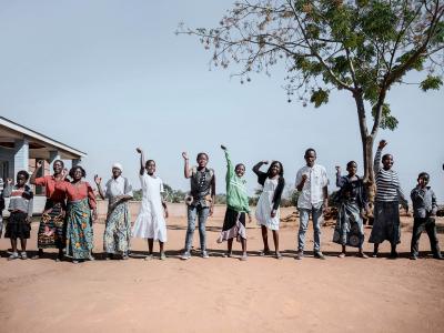 Patients and MSF staff perform a dance to welcome new members to the "six-months-meeting day" in Mbulumbuzi Health Centre for the Adolescent HIV project in Malawi, it also monitors all the girls and boy who have already joined the program.
