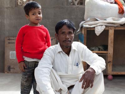 Noor Alam (pictured here with his son) was cured of Hepatitis C at MSF's Machar Clinic in Pakistan in 2016 after recieving a generic version of sofosbuvir. Gilead has priced sofosbuvir at $1,000 per pill in the U.S., despite the fact that manufacturers in India say they could produce this drug for as little as about $1 per pill.